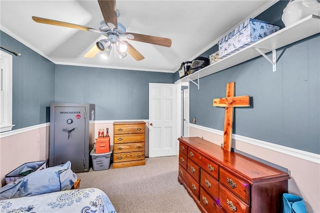 carpeted bedroom with ceiling fan and crown molding