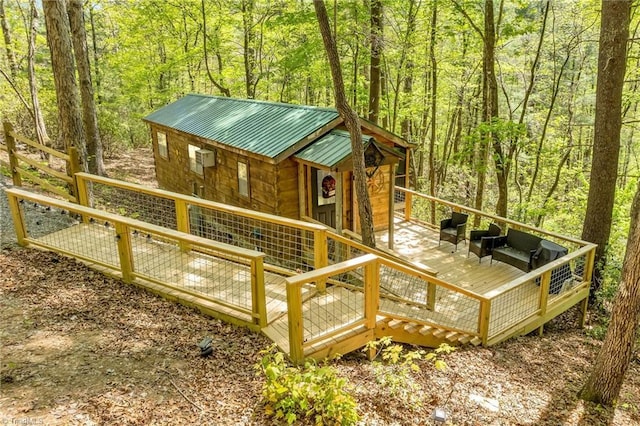 view of playground featuring a wooden deck