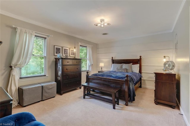 bedroom with light carpet and ornamental molding
