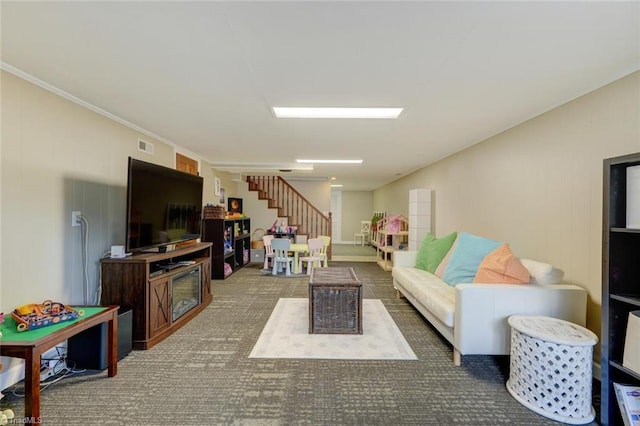 living area with stairs and carpet floors