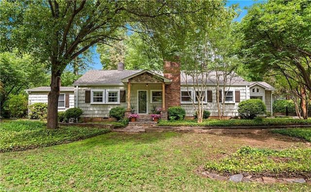 968 Avon Rd, Winston-Salem, NC 27104 - single story home featuring a chimney and a front yard