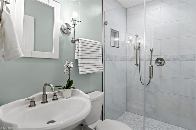968 Avon Rd, Winston-Salem, NC 27104 - full bath with a sink, a stall shower, and toilet