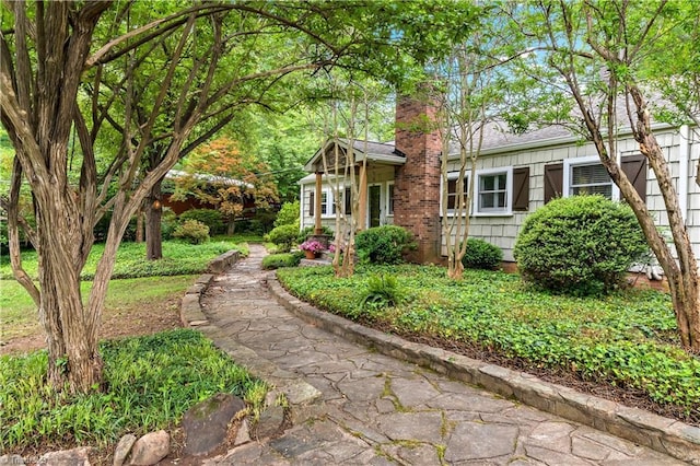 968 Avon Rd, Winston-Salem, NC 27104 - view of home's exterior with a chimney
