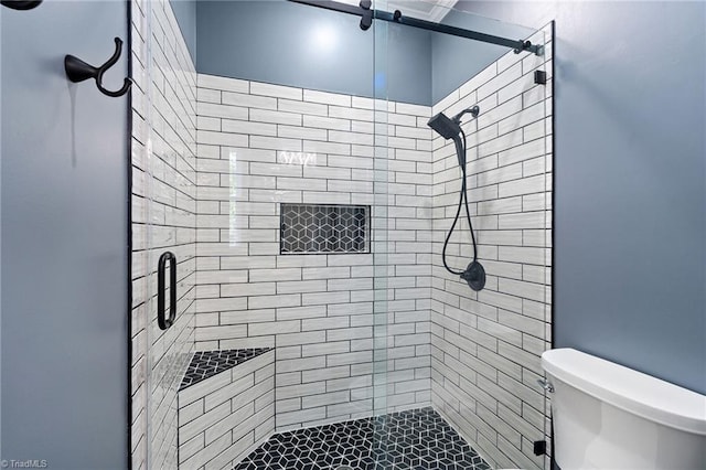 full bath with toilet and a shower stall