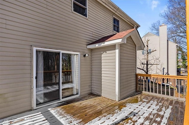 view of snow covered deck