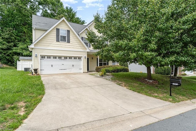 1771 Timber Cove Ct, Winston-Salem, NC 27127 - view of front of house featuring concrete driveway, a front lawn, a garage, and cooling unit