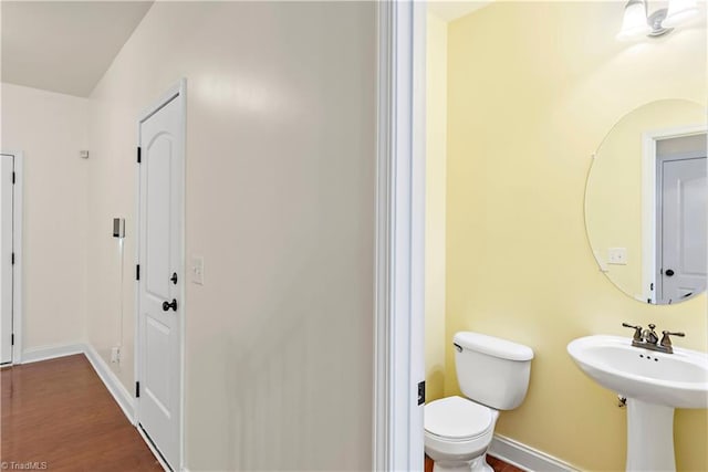 1771 Timber Cove Ct, Winston-Salem, NC 27127 - half bathroom featuring toilet and baseboards