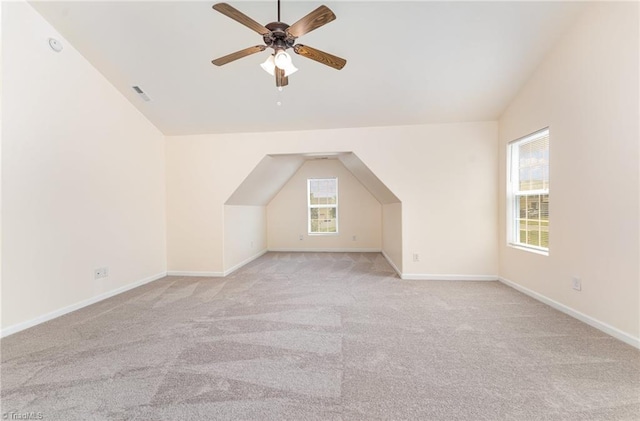 1771 Timber Cove Ct, Winston-Salem, NC 27127 - additional living space with lofted ceiling, ceiling fan, light colored carpet, and baseboards
