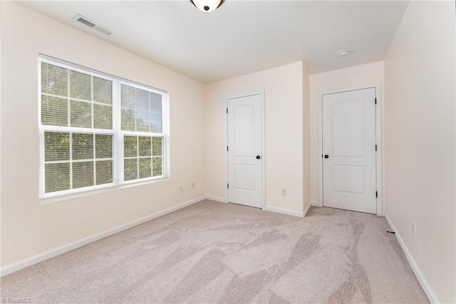 1771 Timber Cove Ct, Winston-Salem, NC 27127 - unfurnished bedroom featuring light colored carpet and baseboards
