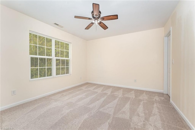 1771 Timber Cove Ct, Winston-Salem, NC 27127 - empty room with ceiling fan, light colored carpet, and baseboards