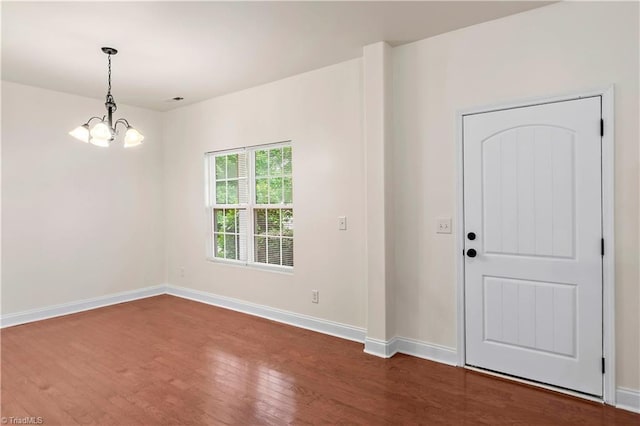 1771 Timber Cove Ct, Winston-Salem, NC 27127 - entryway featuring a chandelier, dark wood-type flooring, and baseboards