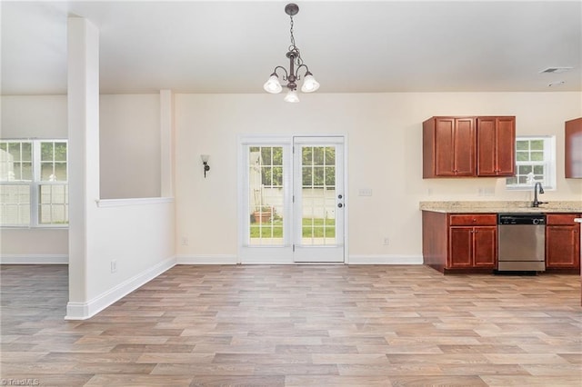 1771 Timber Cove Ct, Winston-Salem, NC 27127 - kitchen with dishwasher, light wood-style flooring, a chandelier, and healthy amount of natural light