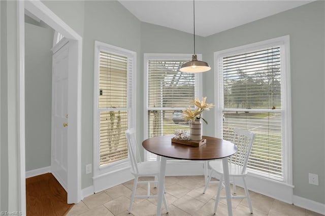 dining area with a healthy amount of sunlight and light tile patterned flooring