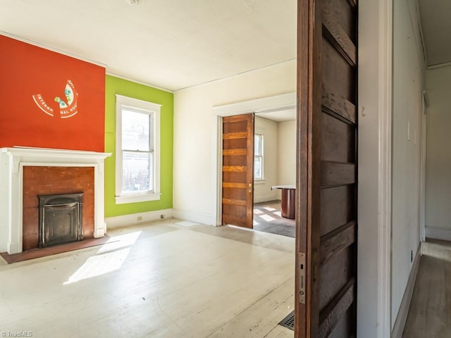 unfurnished living room with light hardwood / wood-style flooring