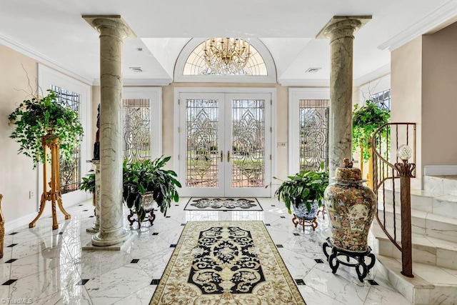 sunroom / solarium with decorative columns, a healthy amount of sunlight, and french doors