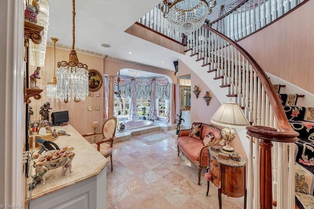 foyer with a chandelier