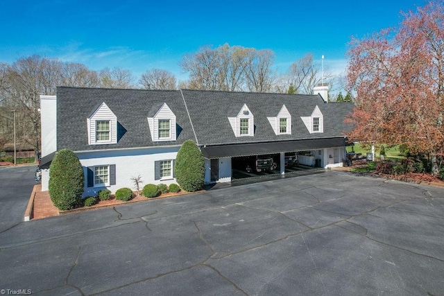 view of front of house with a carport