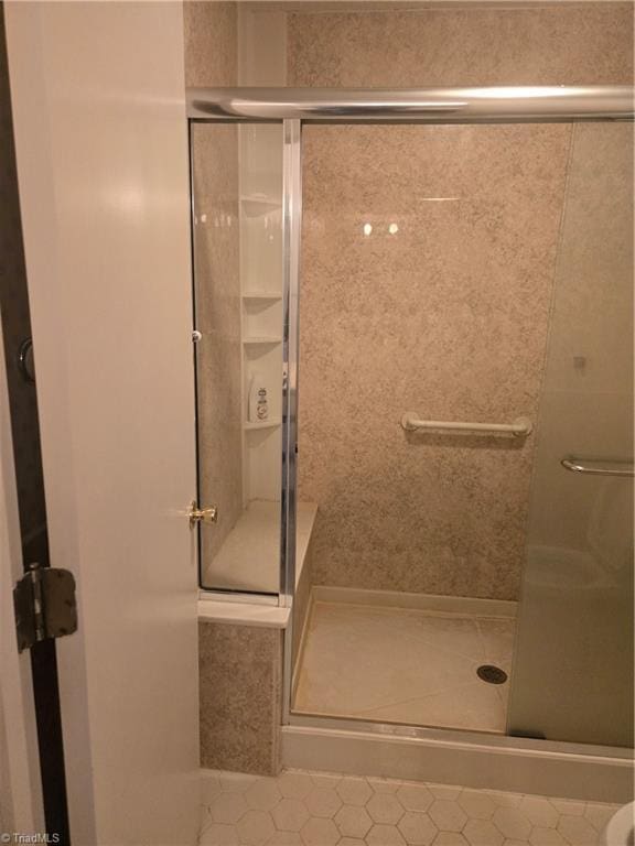 bathroom featuring a stall shower