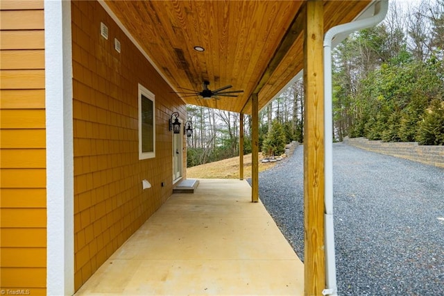 view of patio featuring a ceiling fan