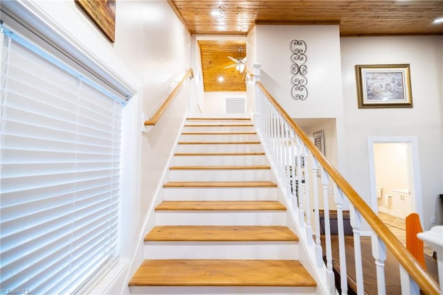 staircase with wooden ceiling, a ceiling fan, and recessed lighting