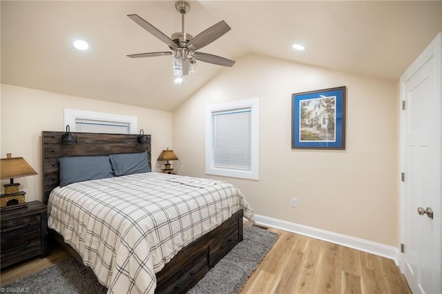 bedroom with recessed lighting, a ceiling fan, vaulted ceiling, light wood-type flooring, and baseboards