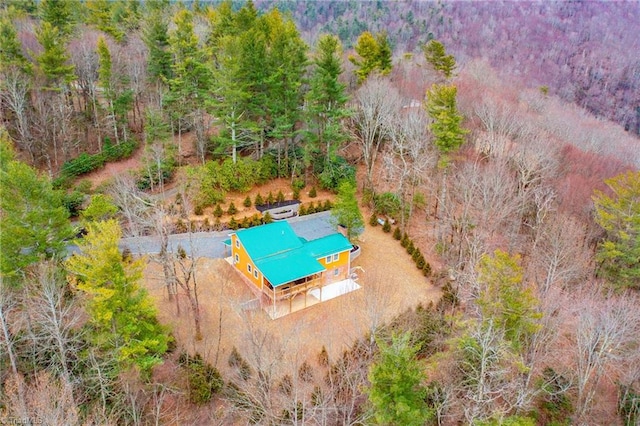 bird's eye view featuring a view of trees