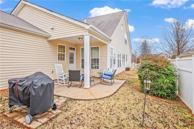 rear view of property featuring a patio