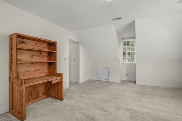 1113 Smokewood Dr, Apex, NC 27502 - unfurnished living room with carpet floors, lofted ceiling, and baseboards