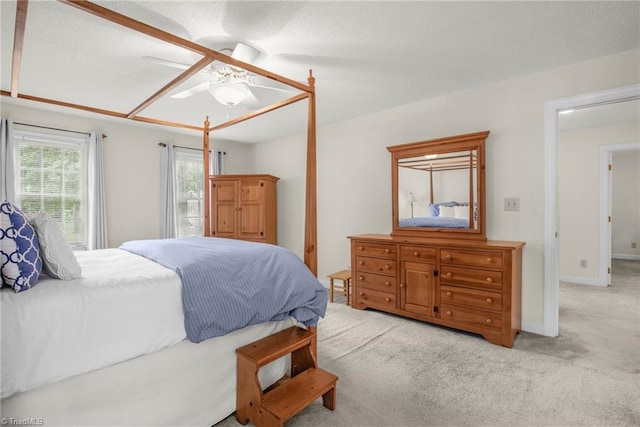 1113 Smokewood Dr, Apex, NC 27502 - bedroom featuring carpet flooring, a ceiling fan, and baseboards