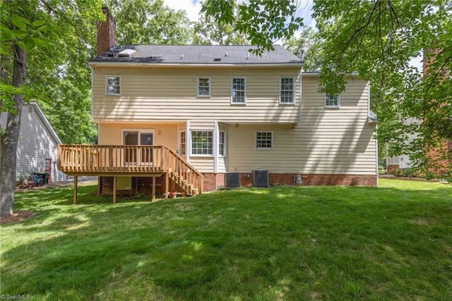 1113 Smokewood Dr, Apex, NC 27502 - back of property with a deck, central AC unit, a lawn, a chimney, and stairs