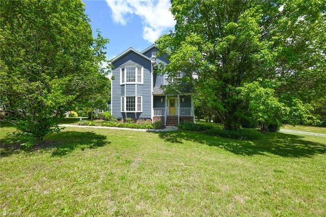 2377 Barber Rd, Elon, NC 27244 - view of front of home with a porch and a front yard