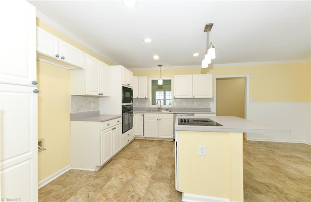 2377 Barber Rd, Elon, NC 27244 - kitchen with black appliances, a sink, ornamental molding, tasteful backsplash, and a center island