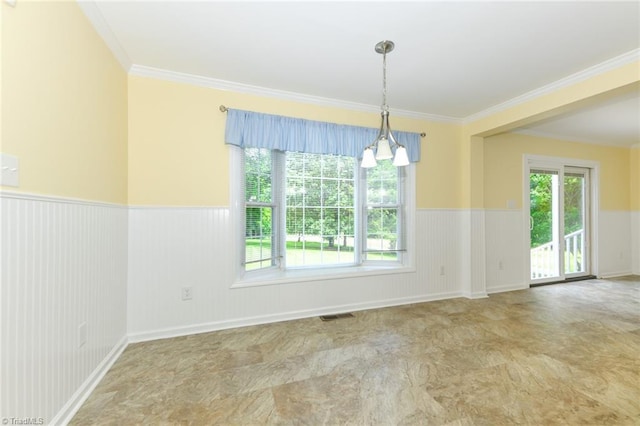 2377 Barber Rd, Elon, NC 27244 - empty room with wainscoting, ornamental molding, and a chandelier