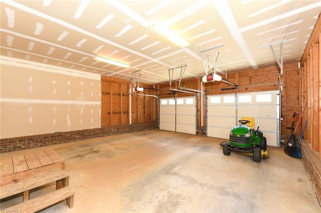 2377 Barber Rd, Elon, NC 27244 - garage featuring a garage door opener