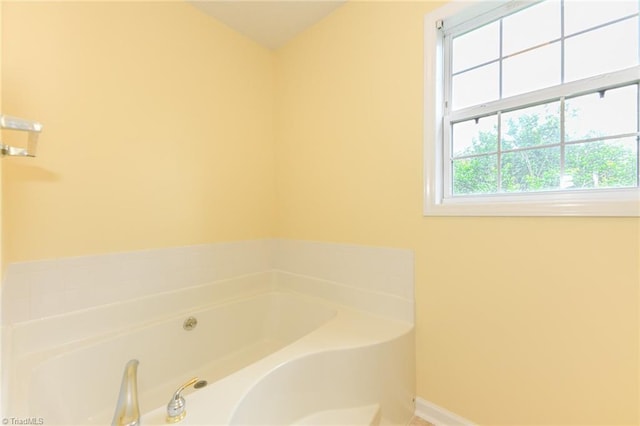 2377 Barber Rd, Elon, NC 27244 - full bath featuring a bath and baseboards