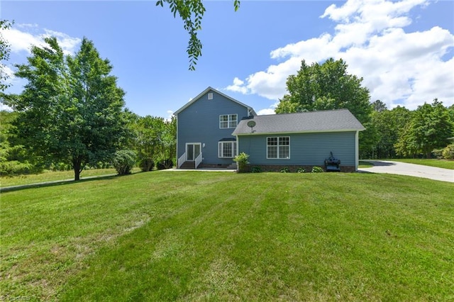 2377 Barber Rd, Elon, NC 27244 - rear view of house with a yard and entry steps