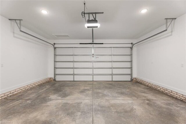 6975 Orchard Path Dr, Clemmons, NC 27012 - garage with a garage door opener