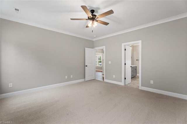 6975 Orchard Path Dr, Clemmons, NC 27012 - unfurnished bedroom with ornamental molding, light carpet, baseboards, ensuite bath, and a ceiling fan