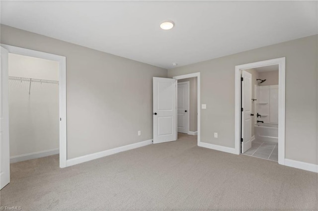 6975 Orchard Path Dr, Clemmons, NC 27012 - unfurnished bedroom with carpet flooring, baseboards, and a closet