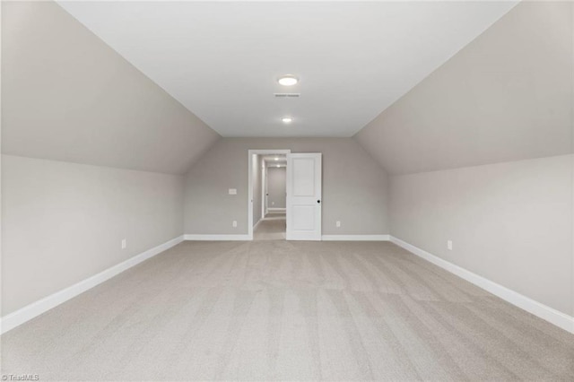 6975 Orchard Path Dr, Clemmons, NC 27012 - bonus room with light carpet, lofted ceiling, and baseboards