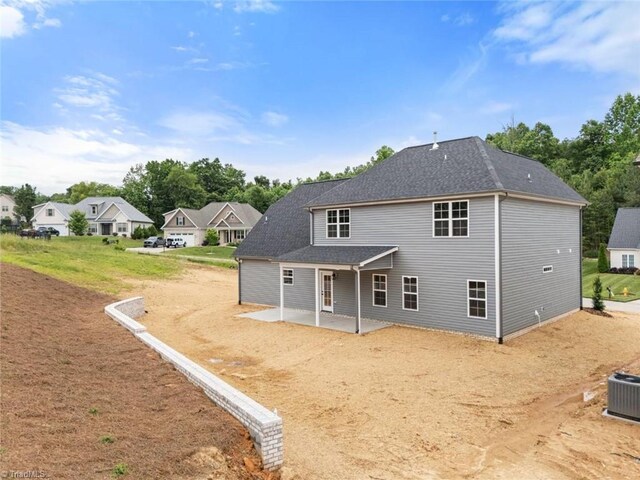 6975 Orchard Path Dr, Clemmons, NC 27012 - back of property with a patio and cooling unit