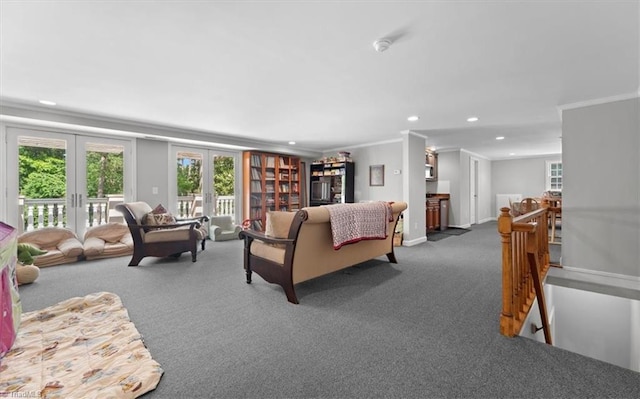 living room featuring ornamental molding, carpet, and french doors