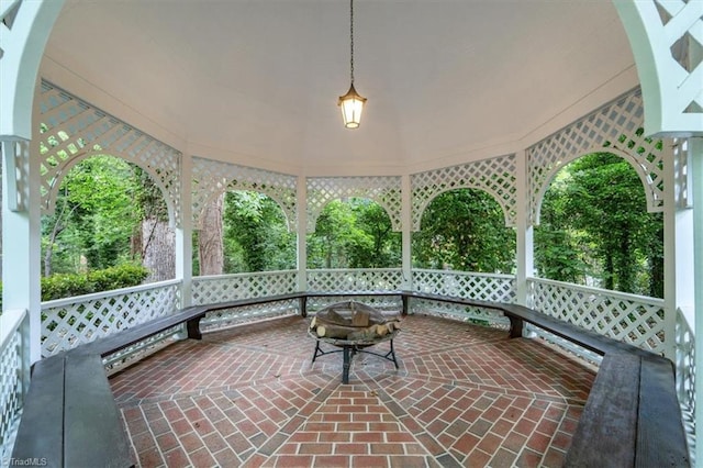 view of patio / terrace with an outdoor fire pit