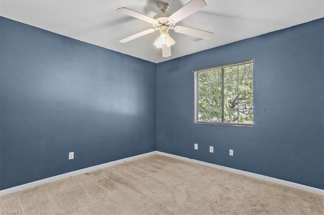 4103 Scotney Dr, Greensboro, NC 27407 - carpeted empty room featuring ceiling fan and a textured ceiling