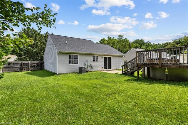 4103 Scotney Dr, Greensboro, NC 27407 - back of property featuring a wooden deck, stairs, and a shingled roof
