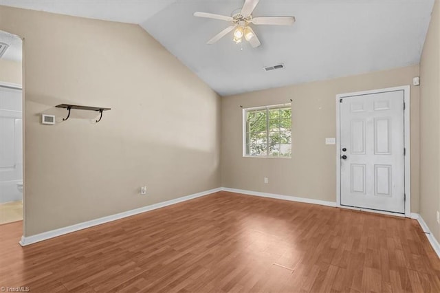 4103 Scotney Dr, Greensboro, NC 27407 - unfurnished room with light wood-type flooring, lofted ceiling, and ceiling fan