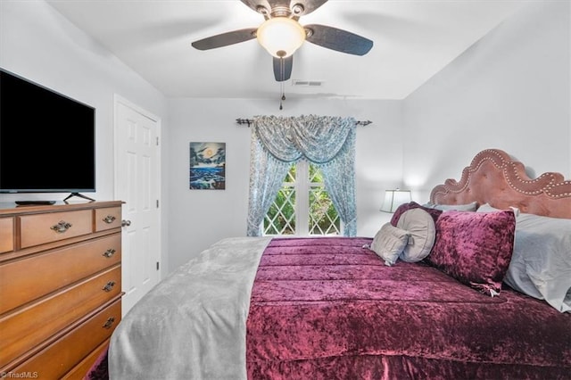 bedroom with visible vents and ceiling fan