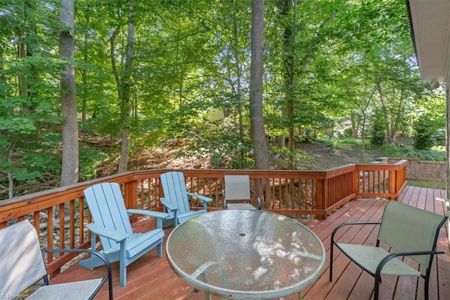 deck featuring outdoor dining space