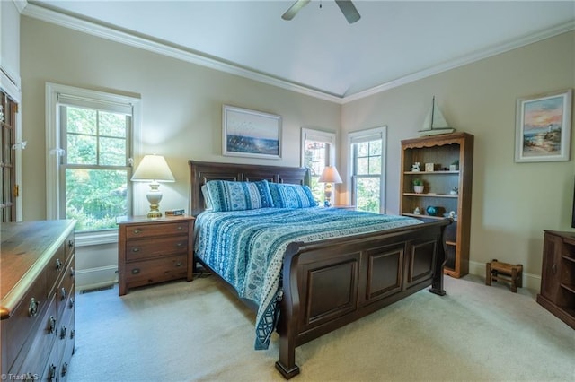 bedroom featuring crown molding, a ceiling fan, baseboards, and light colored carpet