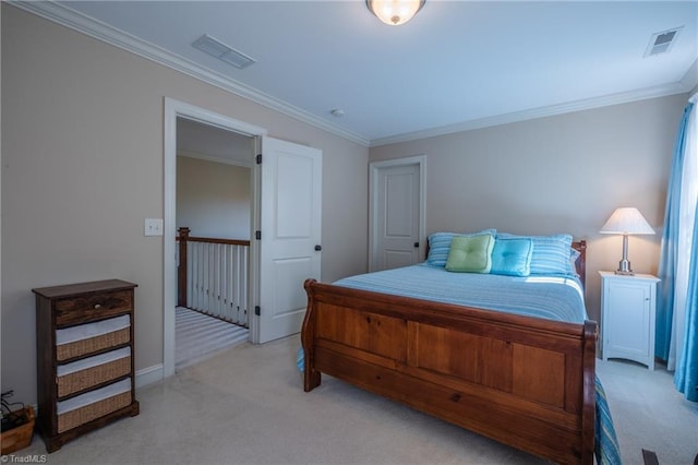bedroom with crown molding, carpet flooring, and visible vents